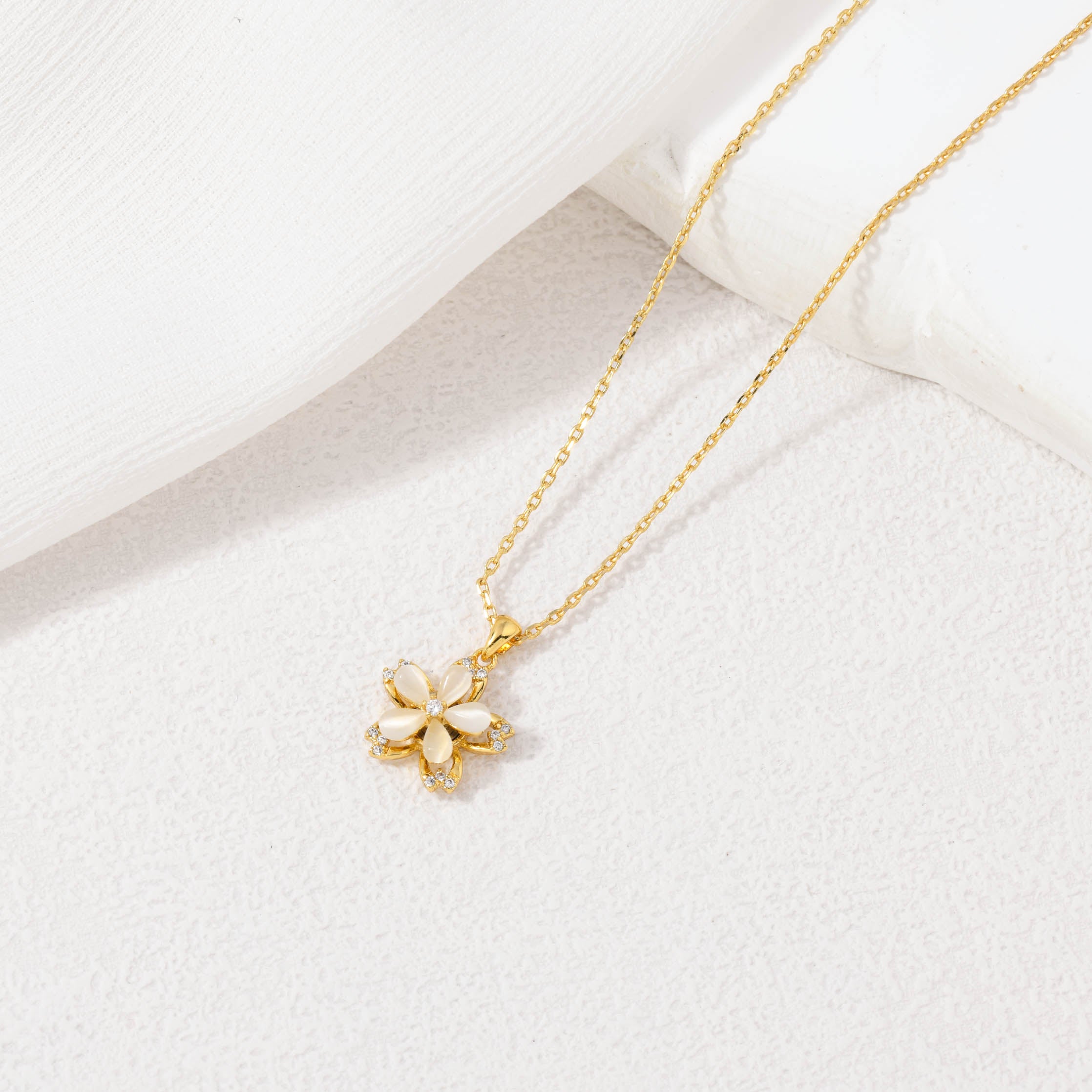 Spinning Golden Flower Necklace