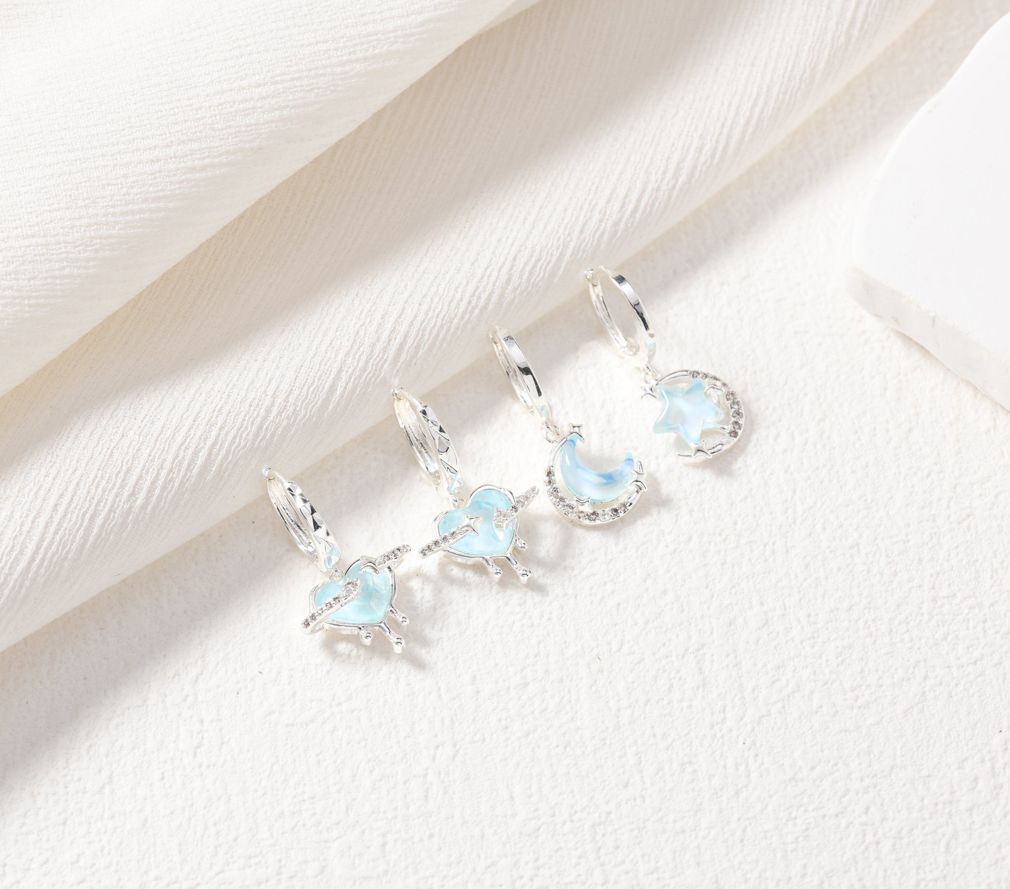 Galaxy Tears Huggie Earrings