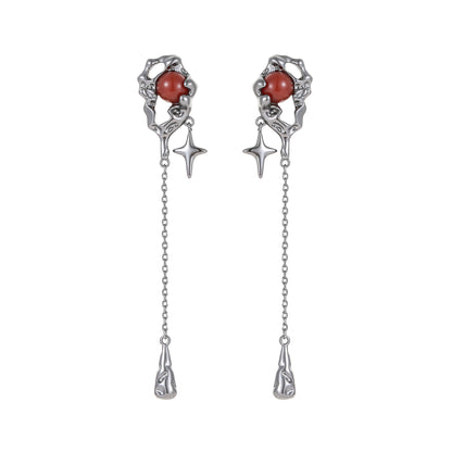 Black mars earrings – on white background