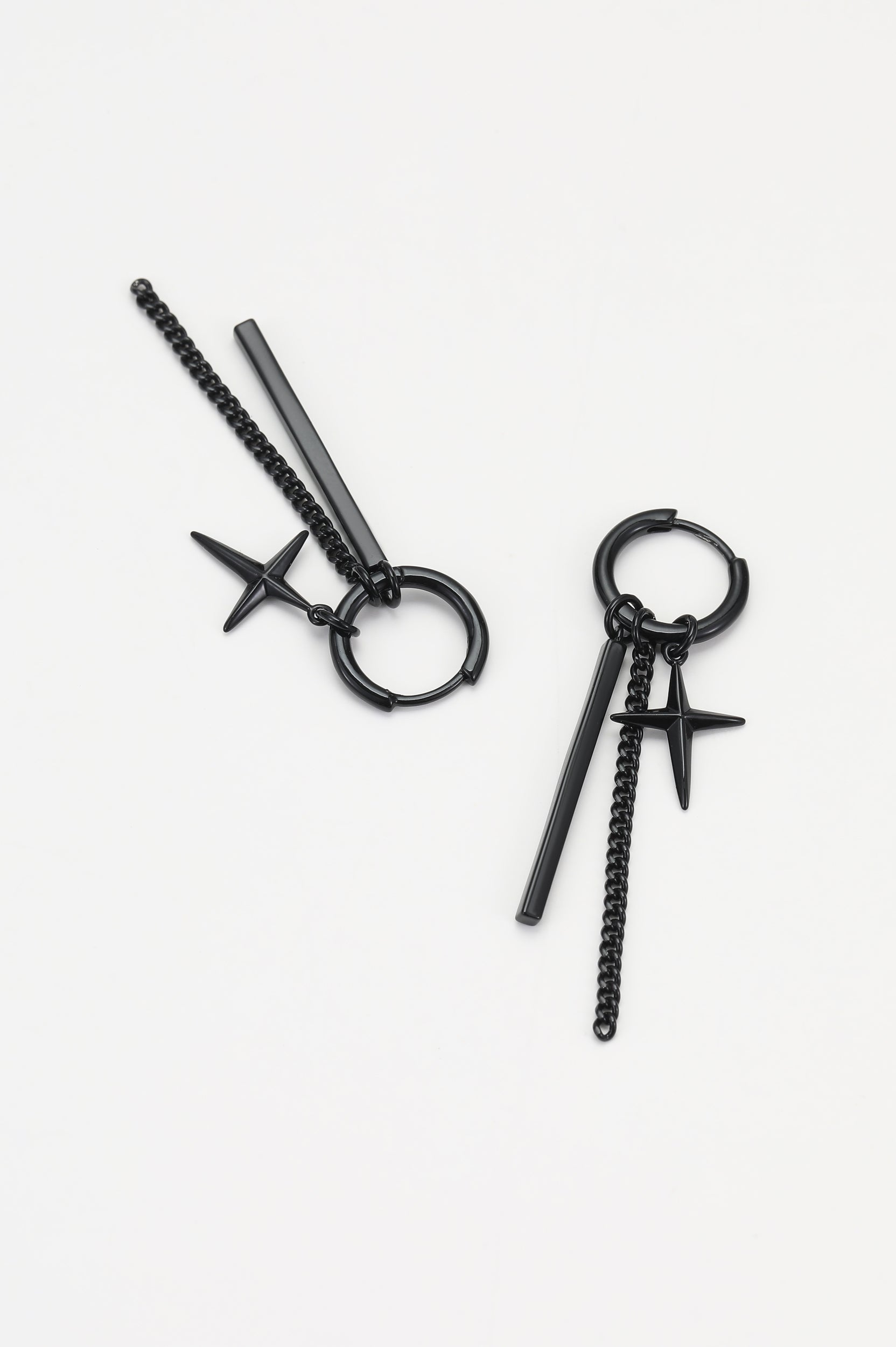 Black rune earrings – alternate angle