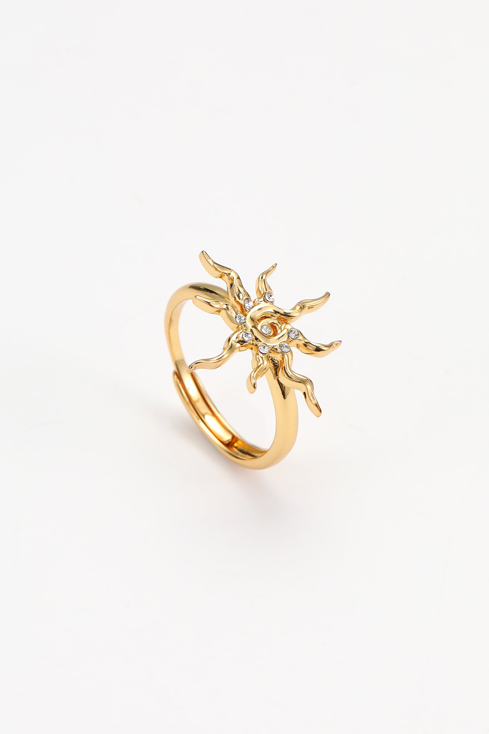 Gold soln ring – on white background