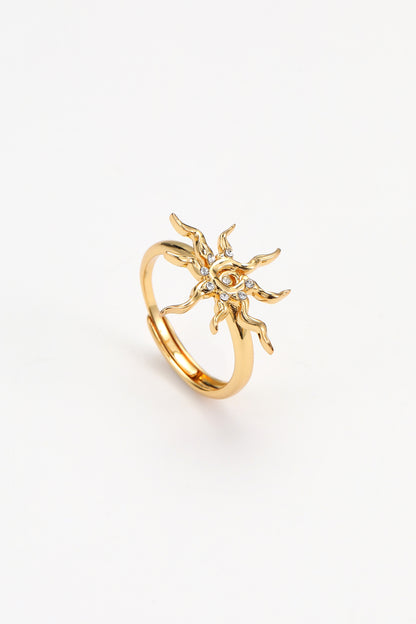 Gold soln ring – on white background