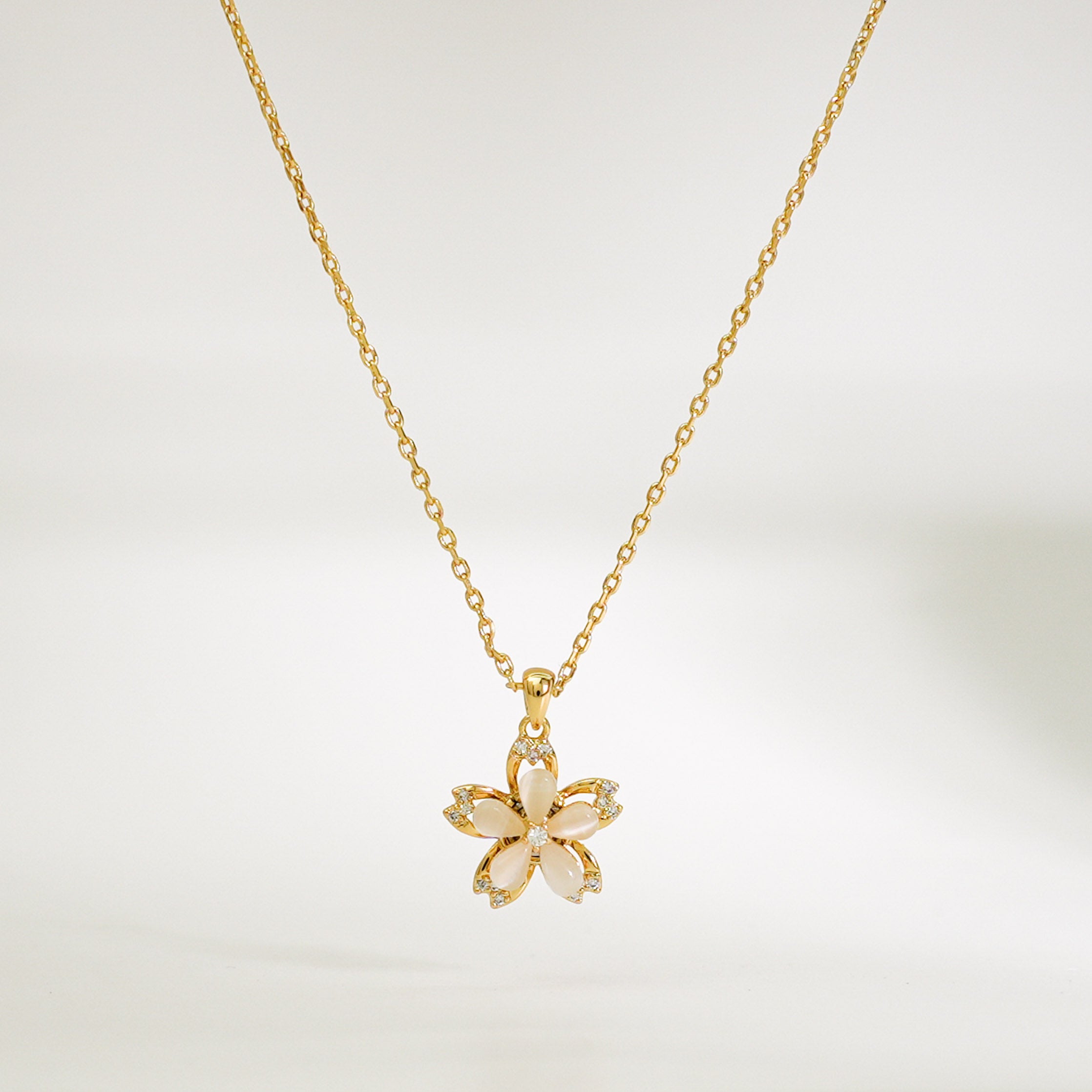 Spinning Golden Flower Necklace