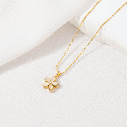 Spinning Golden Flower Necklace