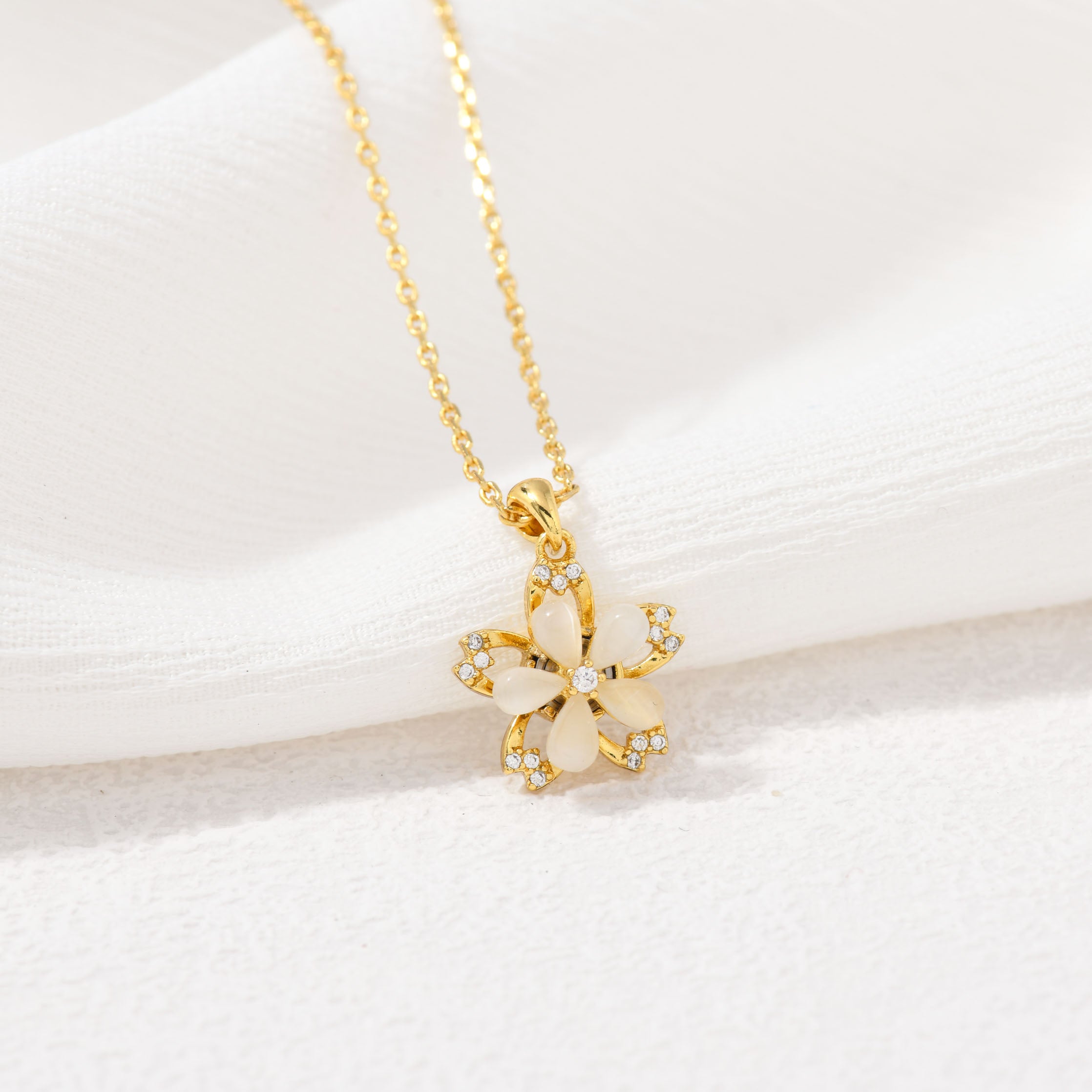Spinning Golden Flower Necklace