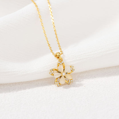 Spinning Golden Flower Necklace