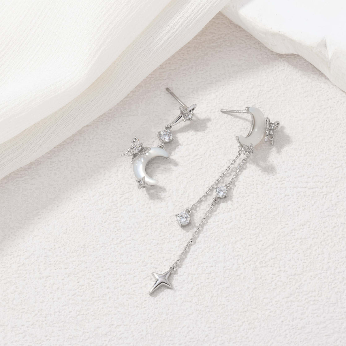 Silver nocturne wings earrings – alternate angle