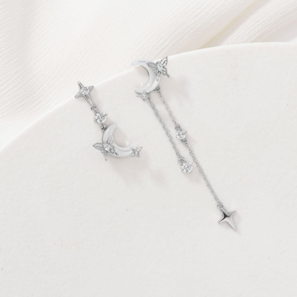 Silver nocturne wings earrings – alternate angle