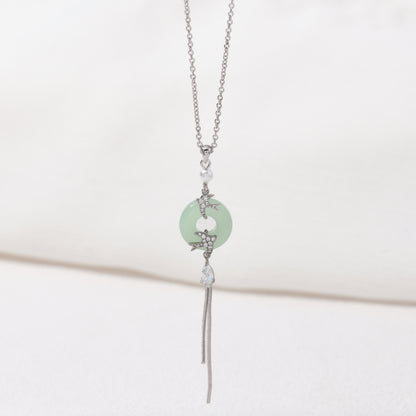 Silver imitation jade bird necklace – on white background