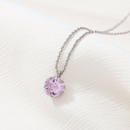 Silver cherry blossom gem necklace – on white background