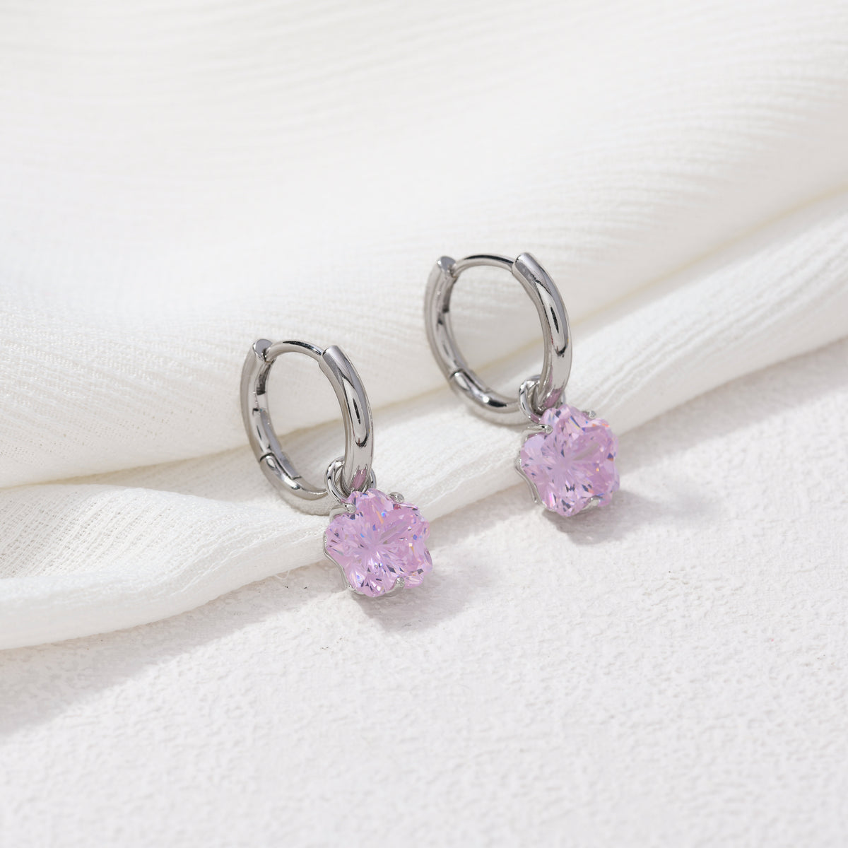 Silver cherry blossom gem hoops – on white background