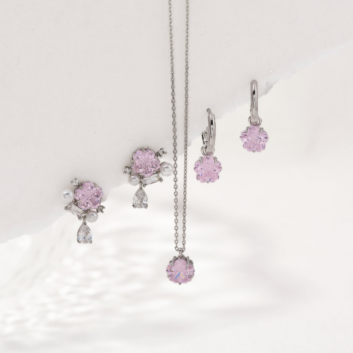 Silver cherry blossom gem studs – detail view
