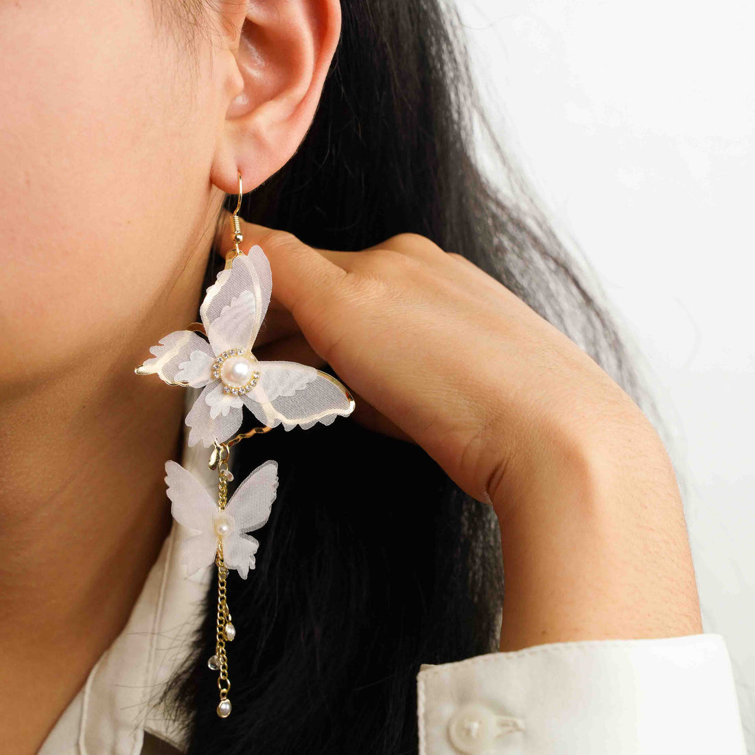 White Dangling Butterfly Earrings